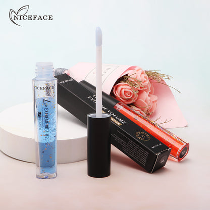 NICEFACE שמן שפתיים מועשר בפתיתי זהב, מעניק לחות, מטשטש קמטוטים ומעניק מראה שפתיים יפהפה.